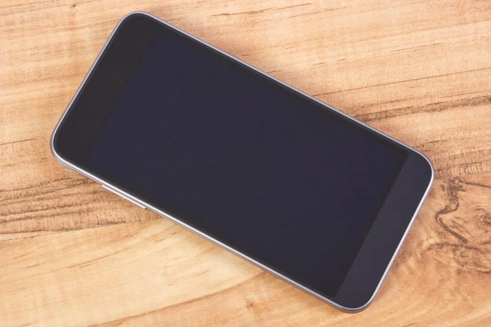 Mobile Phone With Blank Screen On Table